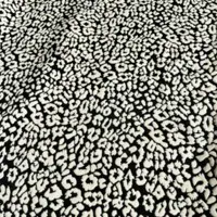 Leopard beige sur noir